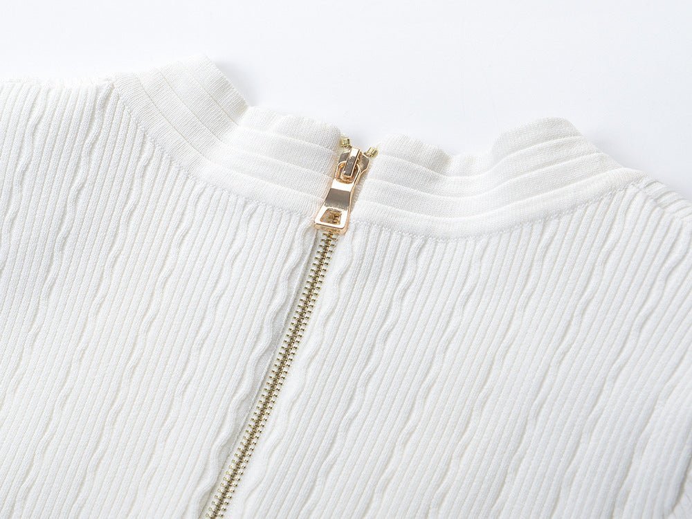 Roselia Top – Fitted Ribbed Knit – Short Sleeves – Gold Button Detail – Front Pockets – Tailored Silhouette – Textured Fabric