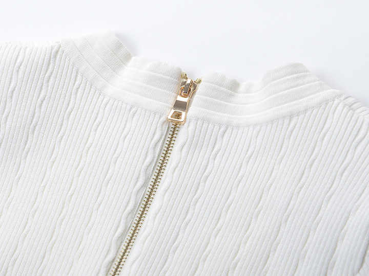 Roselia Top – Fitted Ribbed Knit – Short Sleeves – Gold Button Detail – Front Pockets – Tailored Silhouette – Textured Fabric