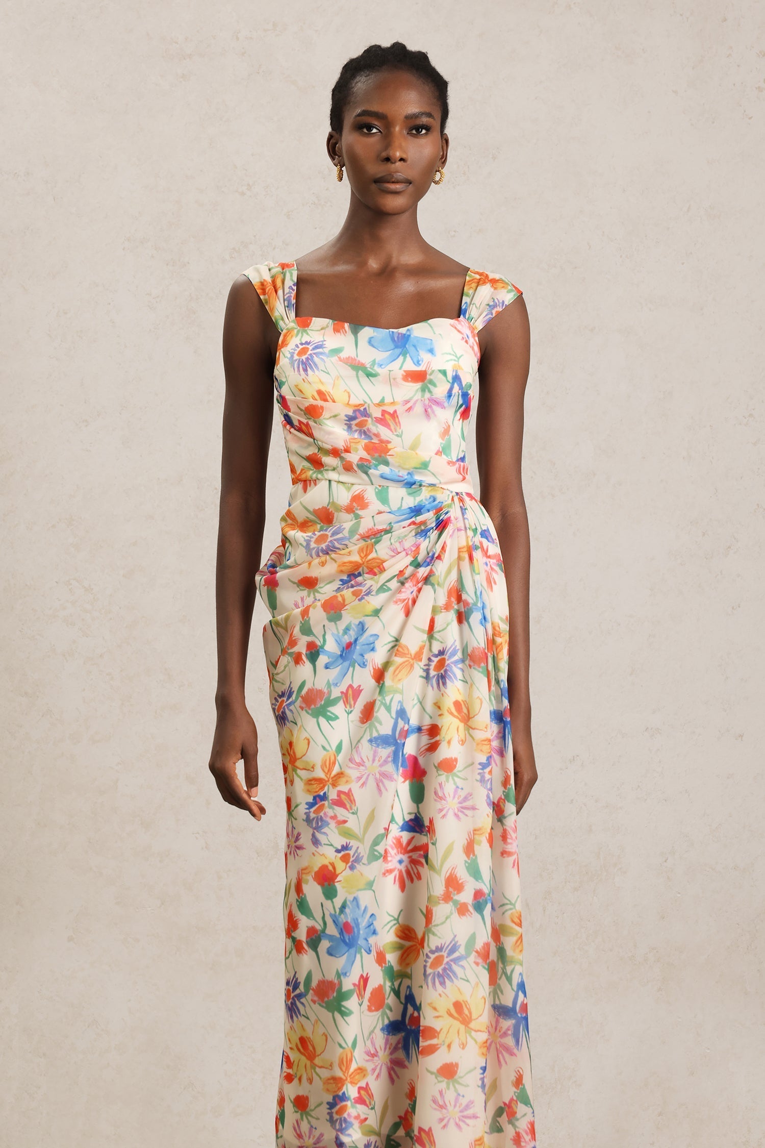 Ruby Beige Floral Maxi Dress Halter Neckline Vibrant Prints Chic Comfortable Fit Versatile Elegant Sophisticated Quality Craftsmanship