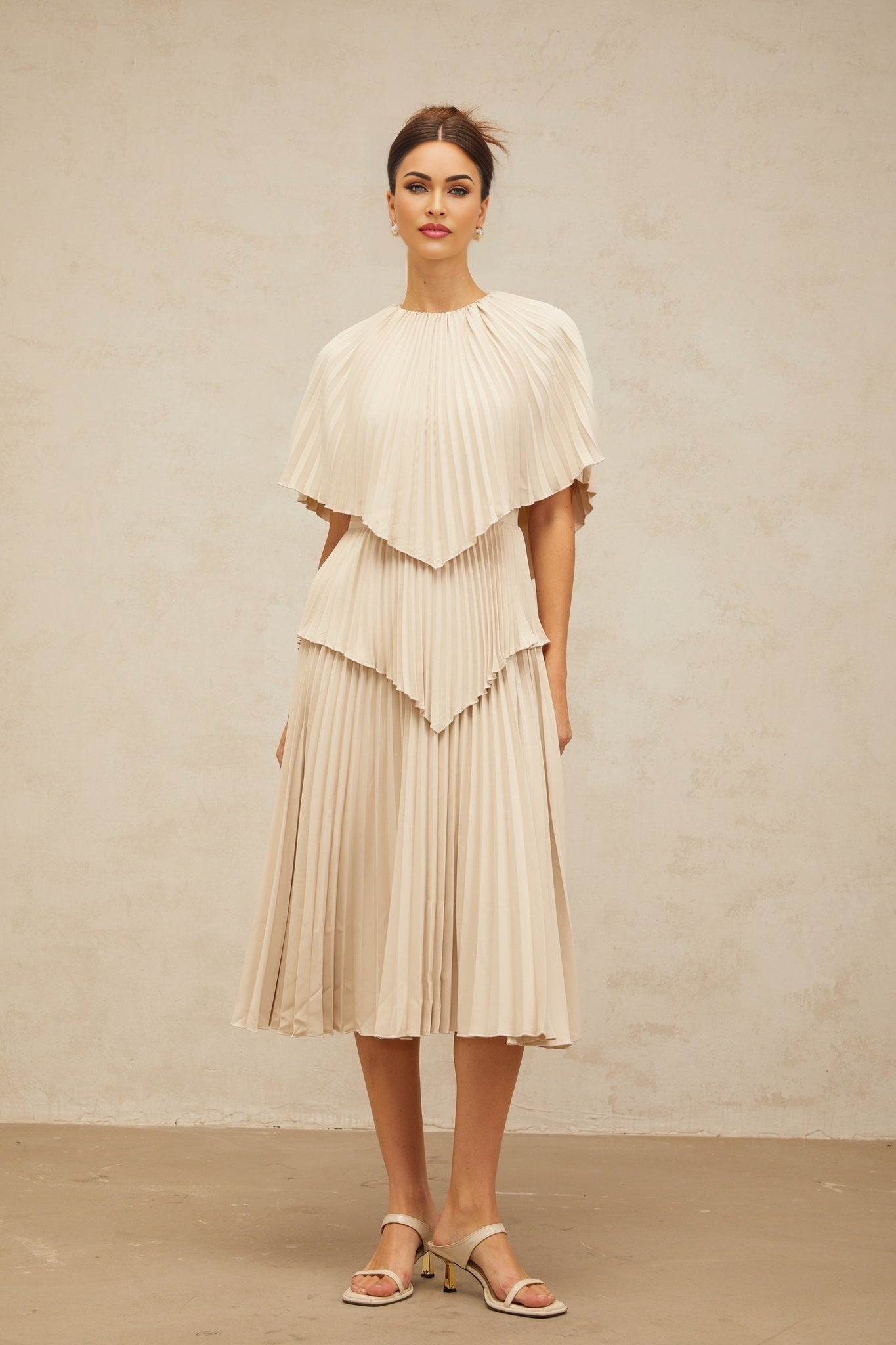 Serafina Midi Dress in Neutrals Crew Neck Batwing Pleated Cape Zip Calf Length