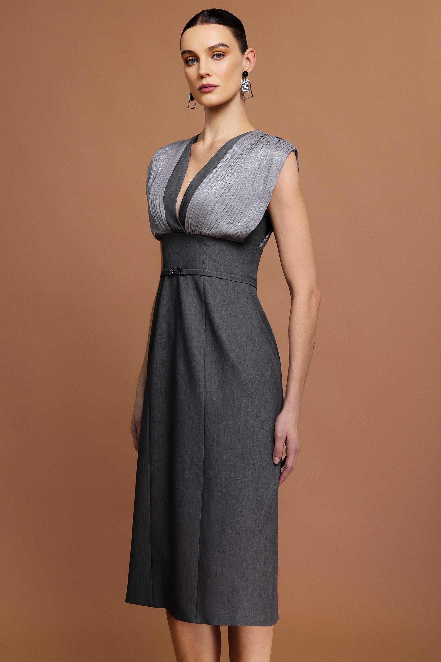 Tullia Gray V-neckline draped bodice midi dress with unique folds and stylish belt for formal occasions