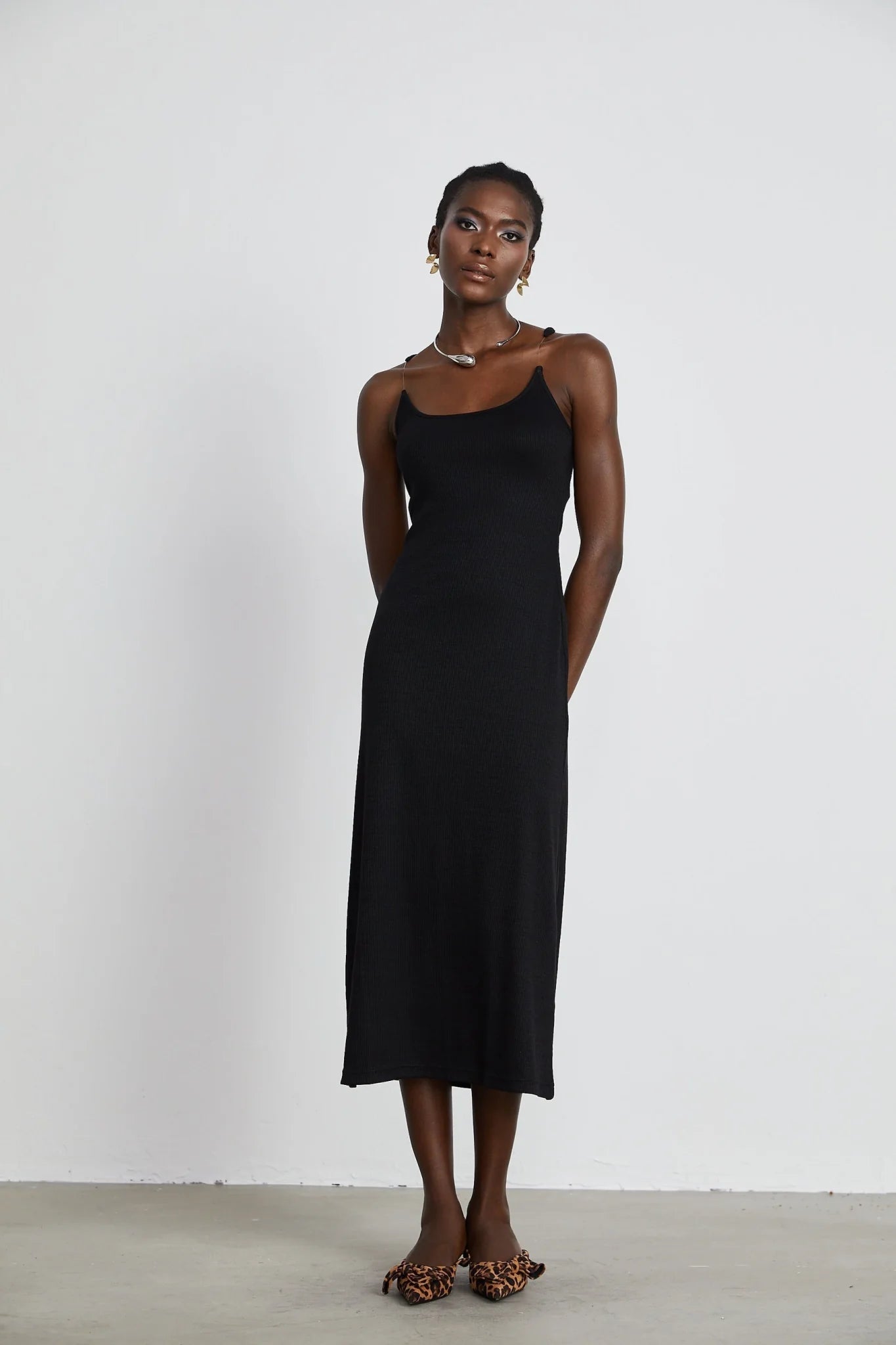 Ursula Maxi Dress in Confident Black with Transparent Straps & Low - Cut Design