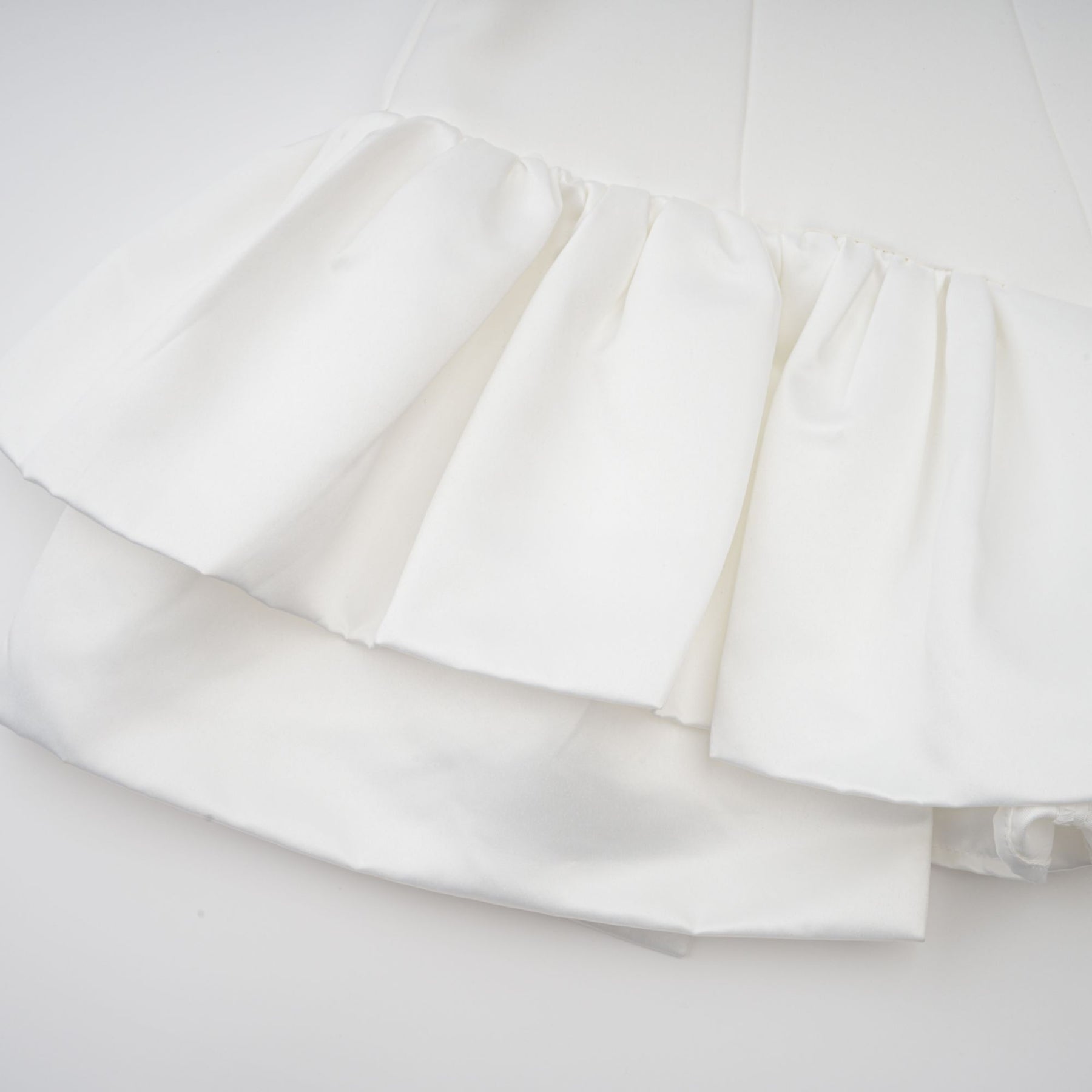 Violetta Mini Dress White Halterneck Ruffled Hem Zip Included