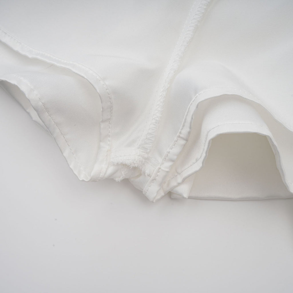 Violetta Mini Dress White Halterneck Ruffled Hem Zip Included