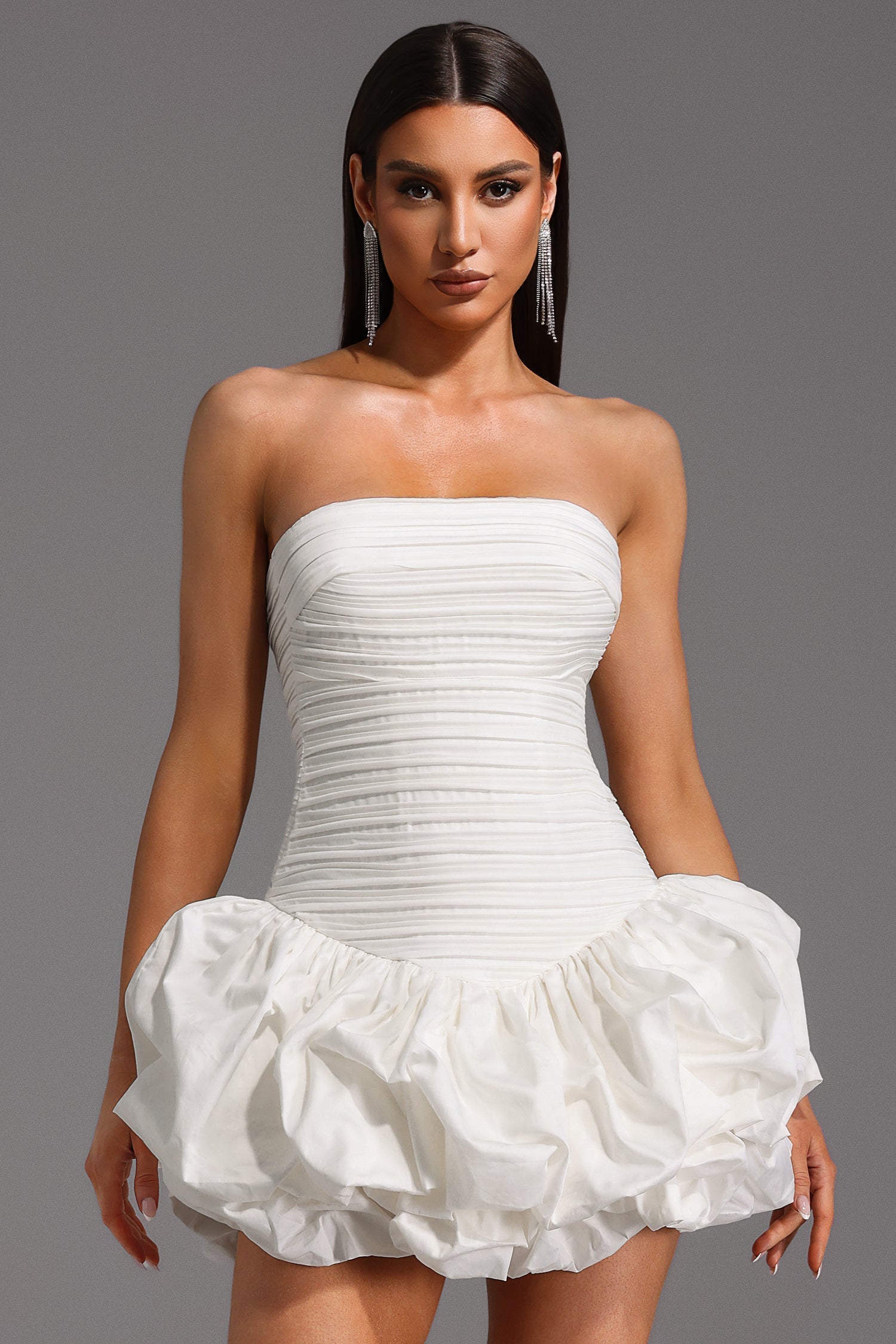 White Rakani Sleeveless Fold Bud Mini Dress with Strapless Neckline and Ruffle Hem